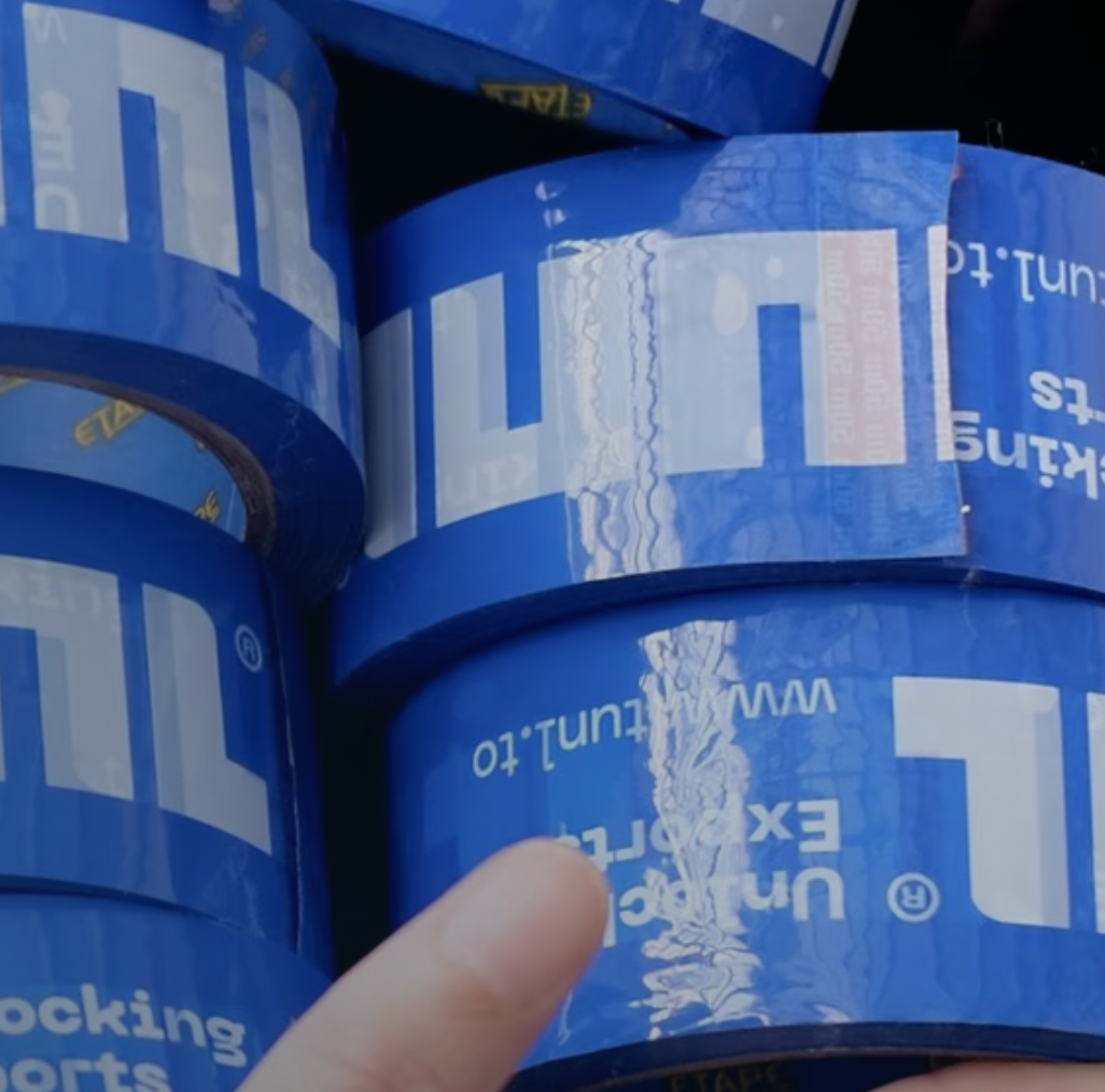 TUNL branded packing tape on export cartons